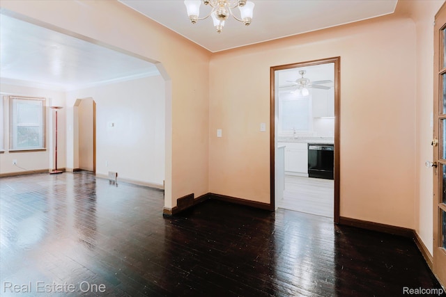 16219 Normandy St, Detroit, MI 48221 - spare room featuring arched walkways, a chandelier, and hardwood / wood-style flooring