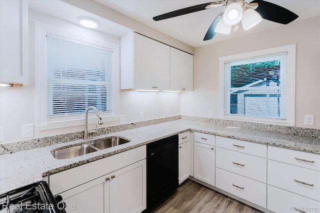 16219 Normandy St, Detroit, MI 48221 - kitchen featuring black appliances, light wood-style floors, white cabinetry, and ceiling fan