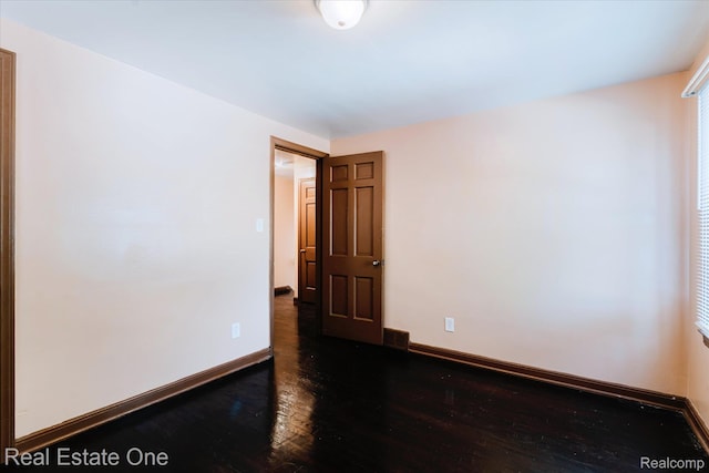 16219 Normandy St, Detroit, MI 48221 - spare room featuring wood finished floors and baseboards