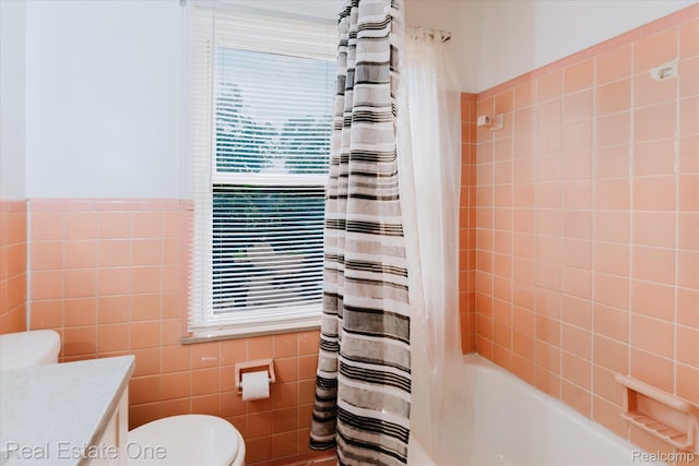 16219 Normandy St, Detroit, MI 48221 - full bathroom with tile walls, shower / tub combo, vanity, and wainscoting