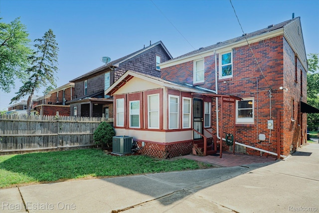 16219 Normandy St, Detroit, MI 48221 - back of property featuring entry steps and brick siding