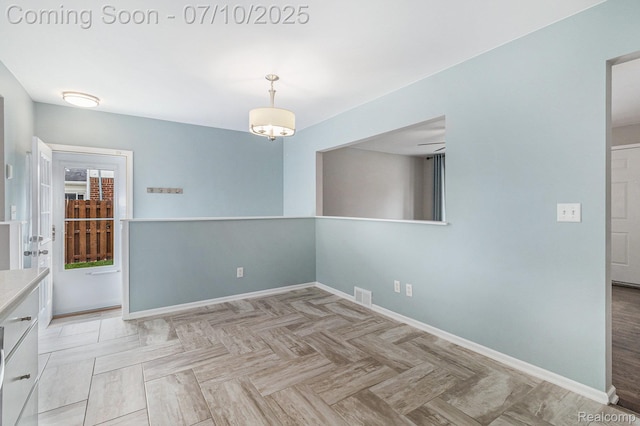 39408 Atkinson Dr, Sterling Heights, MI 48313 - unfurnished dining area featuring baseboards
