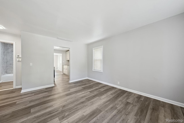 2245 Spring Hill Ave, Inkster, MI 48141 - unfurnished room with dark wood-style flooring