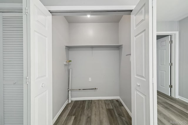 2245 Spring Hill Ave, Inkster, MI 48141 - washroom with dark wood-style flooring and baseboards