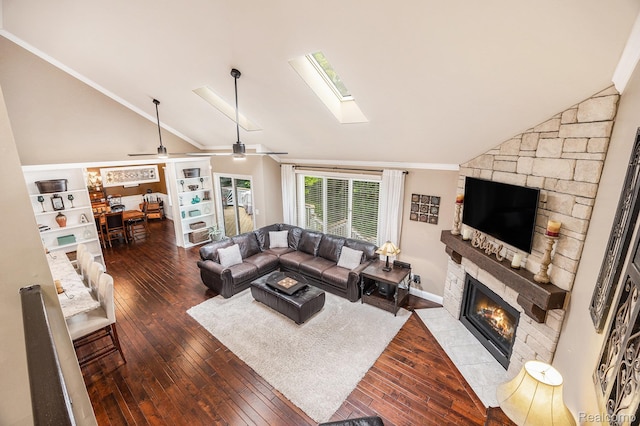 9780 Oak Valley Dr, Clarkston, MI 48348 - living room featuring a stone fireplace, hardwood / wood-style floors, a ceiling fan, high vaulted ceiling, and ornamental molding