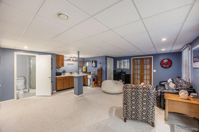 9780 Oak Valley Dr, Clarkston, MI 48348 - living room with a paneled ceiling, light carpet, recessed lighting, and french doors