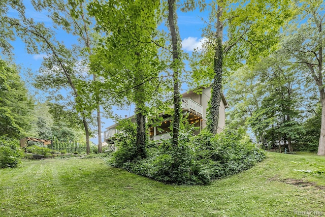 9780 Oak Valley Dr, Clarkston, MI 48348 - view of grassy yard with a balcony