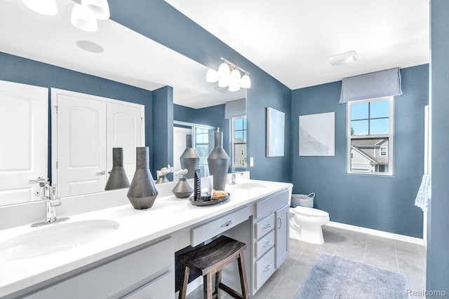 2768 Silo Dr, Saline, MI 48176 - full bathroom featuring double vanity, a shower stall, and tile patterned floors