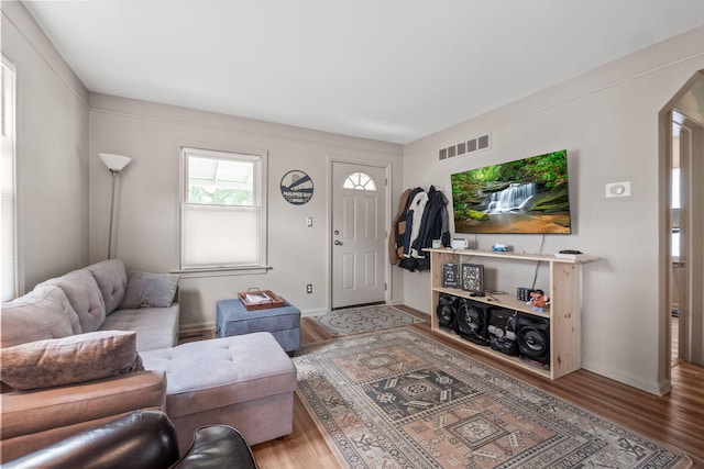 352 W Tacoma St, Clawson, MI 48017 - living room with arched walkways and wood finished floors