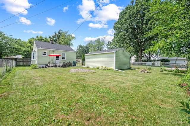 352 W Tacoma St, Clawson, MI 48017 - fenced backyard with an outbuilding