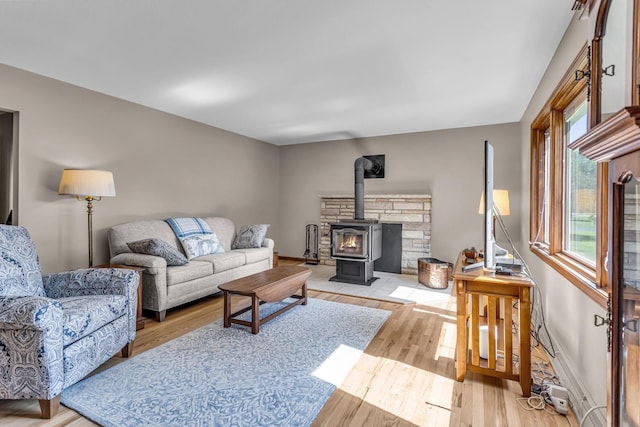 3416 Northlands Ave, Jackson, MI 49201 - living area featuring wood finished floors and a wood stove