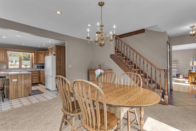 3416 Northlands Ave, Jackson, MI 49201 - dining room with a chandelier, recessed lighting, stairs, and light colored carpet