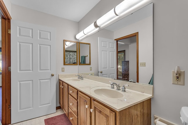 3416 Northlands Ave, Jackson, MI 49201 - bathroom with double vanity and tile patterned floors