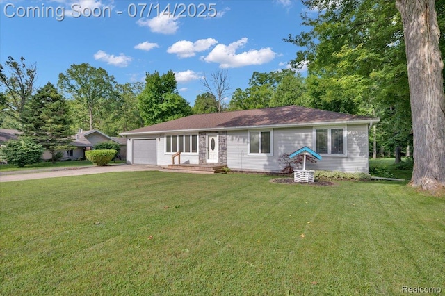 3117 Maumee Trl, Clyde, MI 48049 - ranch-style house featuring concrete driveway, an attached garage, and a front lawn