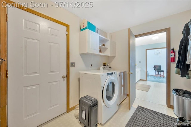 3117 Maumee Trl, Clyde, MI 48049 - washroom with cabinet space, washer and dryer, and light floors