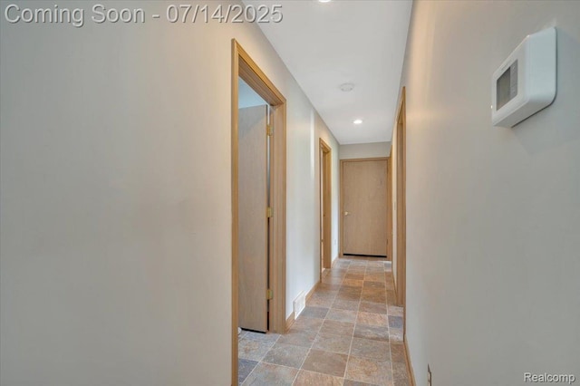 3117 Maumee Trl, Clyde, MI 48049 - hall with stone finish floors and recessed lighting