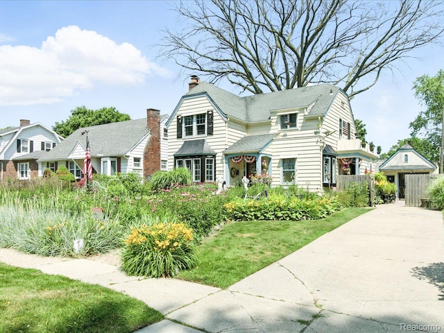1313 Wall St, Port Huron, MI 48060 - view of front of home with a chimney
