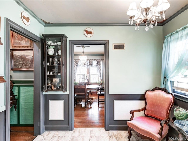 1313 Wall St, Port Huron, MI 48060 - sitting room with a chandelier and ornamental molding