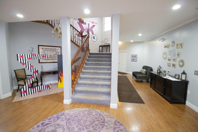 3125 W Michigan Ave, Kalamazoo, MI 49006 - staircase with wood finished floors, recessed lighting, and ornamental molding