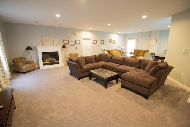 3125 W Michigan Ave, Kalamazoo, MI 49006 - living area featuring light carpet, recessed lighting, and a glass covered fireplace