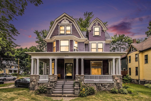 936 W Kalamazoo Ave, Kalamazoo, MI 49007 - view of front of home featuring covered porch and cooling unit