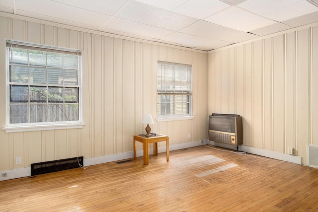 936 W Kalamazoo Ave, Kalamazoo, MI 49007 - unfurnished room featuring light wood-style floors and heating unit