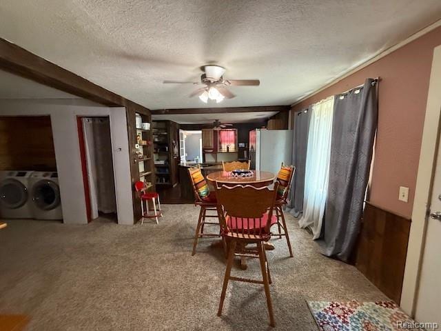 3103 Roush Rd, Hastings, MI 49058 - dining space featuring a ceiling fan, independent washer and dryer, light colored carpet, and a textured ceiling