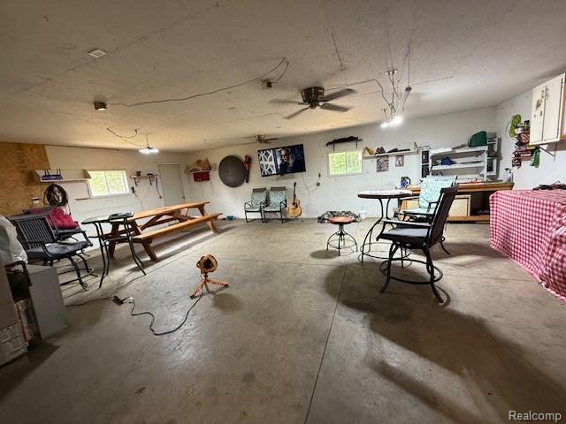 3103 Roush Rd, Hastings, MI 49058 - interior space with unfinished concrete floors and ceiling fan