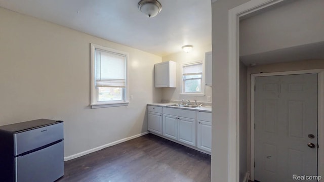 10800 Stratman St, Detroit, MI 48224 - bathroom with vanity and wood finished floors
