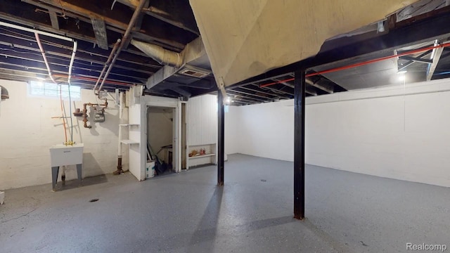 10800 Stratman St, Detroit, MI 48224 - basement with a sink and gas meter