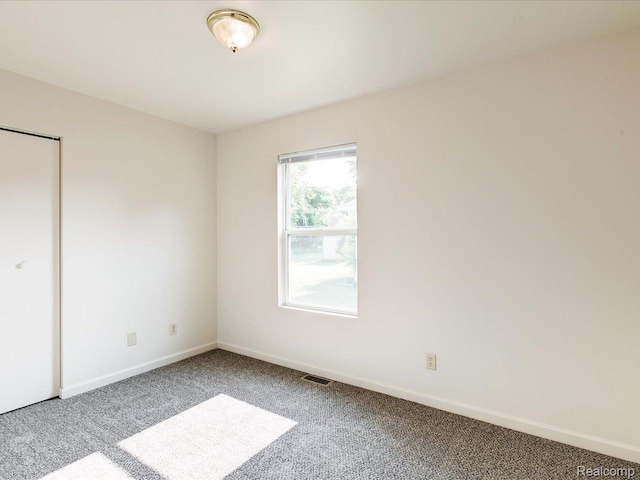 1114 Union St, Port Huron, MI 48060 - unfurnished bedroom featuring carpet and baseboards