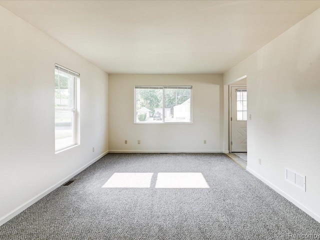 1114 Union St, Port Huron, MI 48060 - unfurnished room with light colored carpet and baseboards
