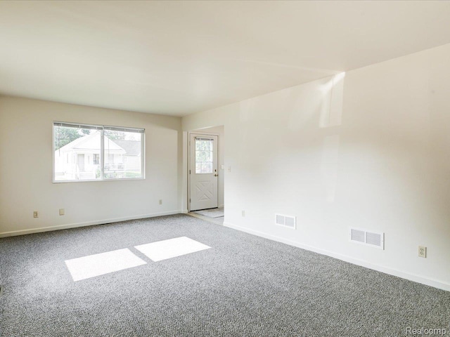 1114 Union St, Port Huron, MI 48060 - empty room featuring light carpet and baseboards