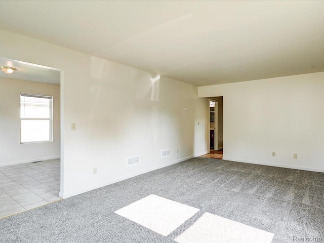 1114 Union St, Port Huron, MI 48060 - spare room featuring carpet flooring and baseboards