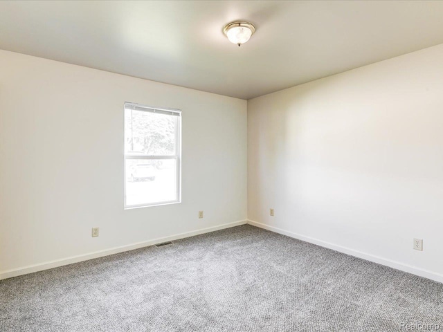 1114 Union St, Port Huron, MI 48060 - carpeted empty room with baseboards
