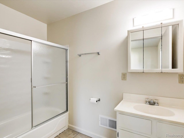 1114 Union St, Port Huron, MI 48060 - bathroom with vanity, combined bath / shower with glass door, and tile patterned flooring