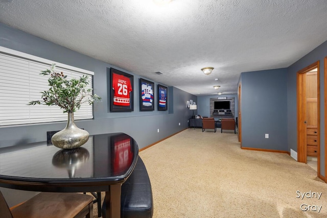 11200 Ivory Valley Dr NE, Rockford, MI 49341 - dining room with a textured ceiling, an office area, and carpet flooring
