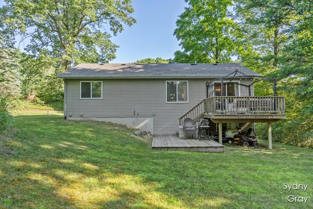 11200 Ivory Valley Dr NE, Rockford, MI 49341 - back of property featuring a deck, a lawn, and stairs