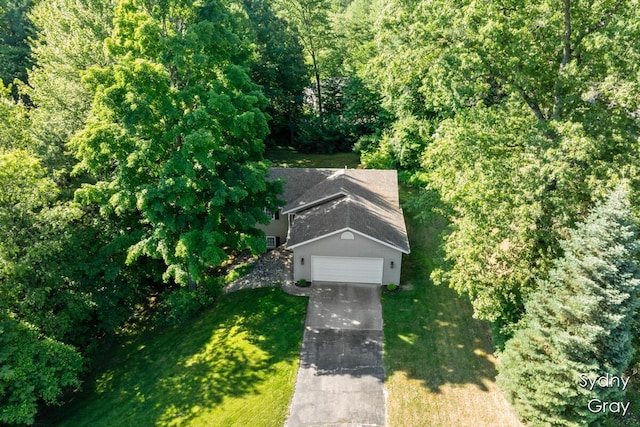11200 Ivory Valley Dr NE, Rockford, MI 49341 - aerial view of property and surrounding area featuring a heavily wooded area