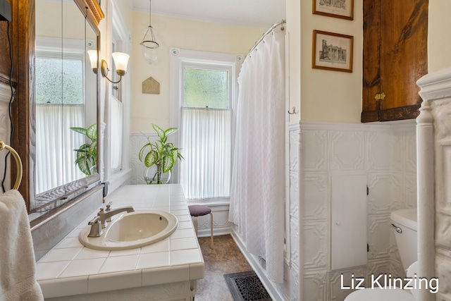 120 Union Ave SE, Grand Rapids, MI 49503 - full bathroom with vanity and ornamental molding