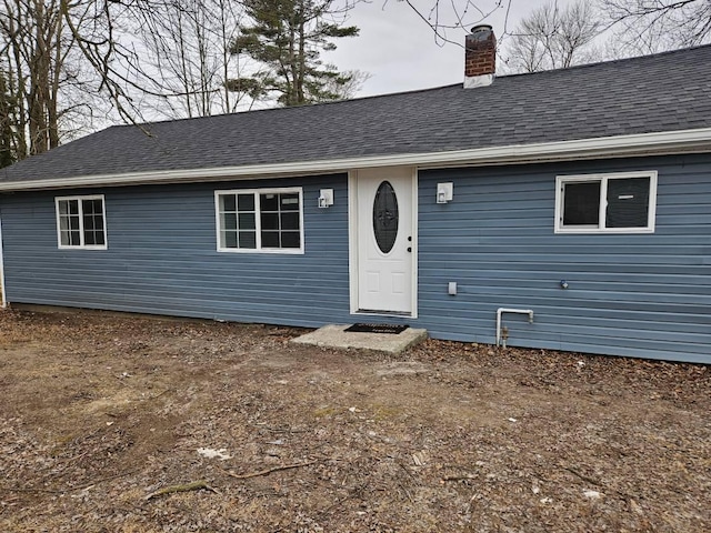 538 Whitney Ave, Morenci, MI 49256 - view of front of property with a chimney and roof with shingles