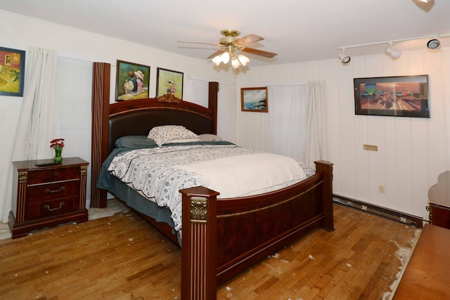 2357 River St, Kalamazoo, MI 49048 - bedroom featuring wood finished floors, track lighting, and a ceiling fan