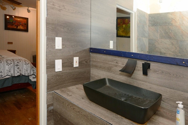 2357 River St, Kalamazoo, MI 49048 - ensuite bathroom with wooden walls and a sink