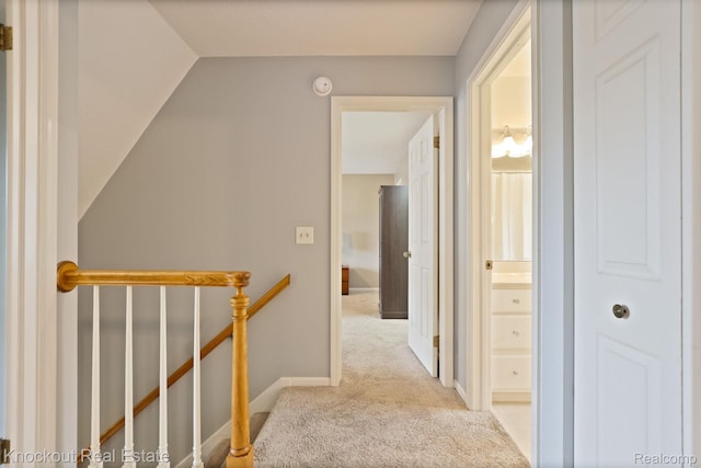 622 W Schleier St, Frankenmuth, MI 48734 - corridor featuring an upstairs landing, carpet, and lofted ceiling
