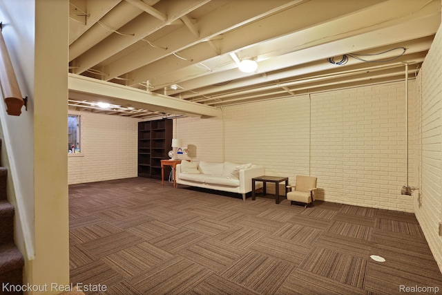 622 W Schleier St, Frankenmuth, MI 48734 - finished below grade area with brick wall and carpet