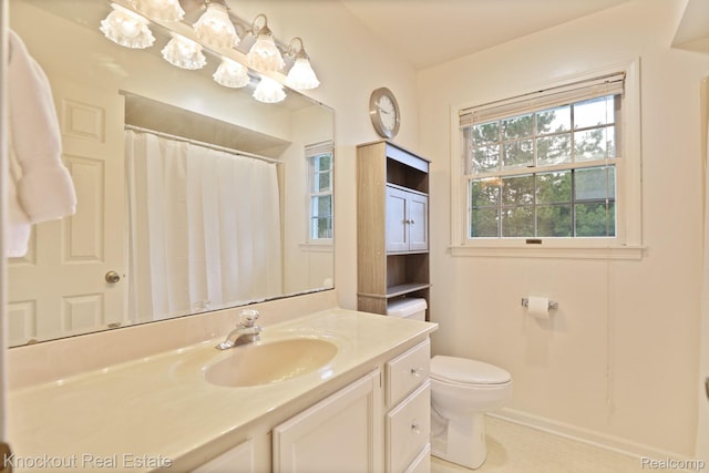 622 W Schleier St, Frankenmuth, MI 48734 - full bathroom featuring vanity, curtained shower, and tile patterned floors
