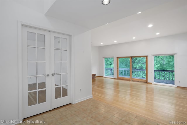 5844 Independence Ln, West Bloomfield, MI 48322 - unfurnished room featuring recessed lighting, french doors, and light wood-style floors