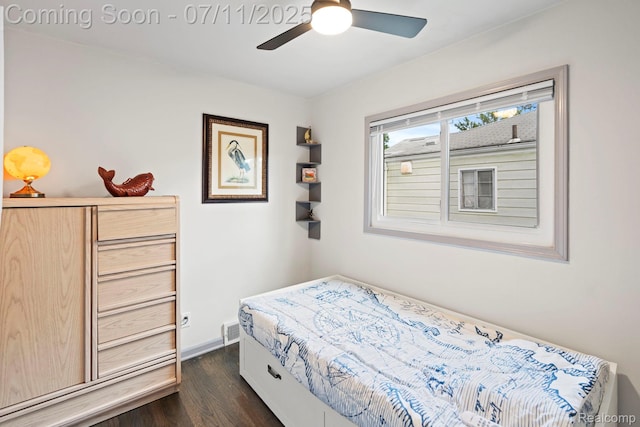 24528 Schroeder Ave, Eastpointe, MI 48021 - bedroom with dark wood-type flooring and a ceiling fan