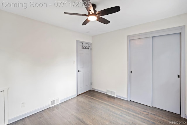 24528 Schroeder Ave, Eastpointe, MI 48021 - unfurnished bedroom featuring wood finished floors, a closet, and ceiling fan