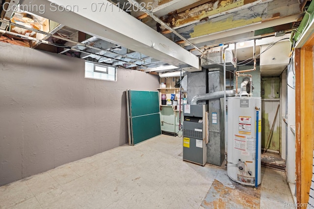 24528 Schroeder Ave, Eastpointe, MI 48021 - below grade area with water heater, heating unit, and a textured wall